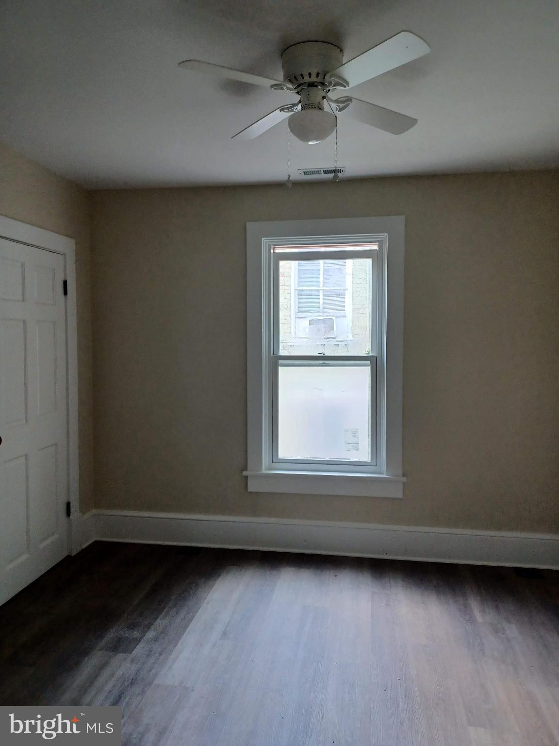302 North Kent Street Winchester, VA 22601 - Photo 5 of 11 an empty room with a window