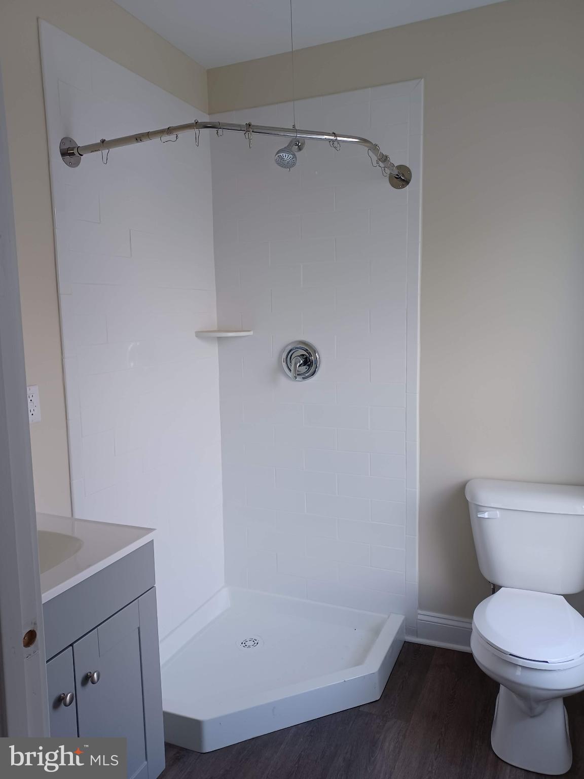302 North Kent Street Winchester, VA 22601 - Photo 7 of 11 a bathroom with a toilet and a shower