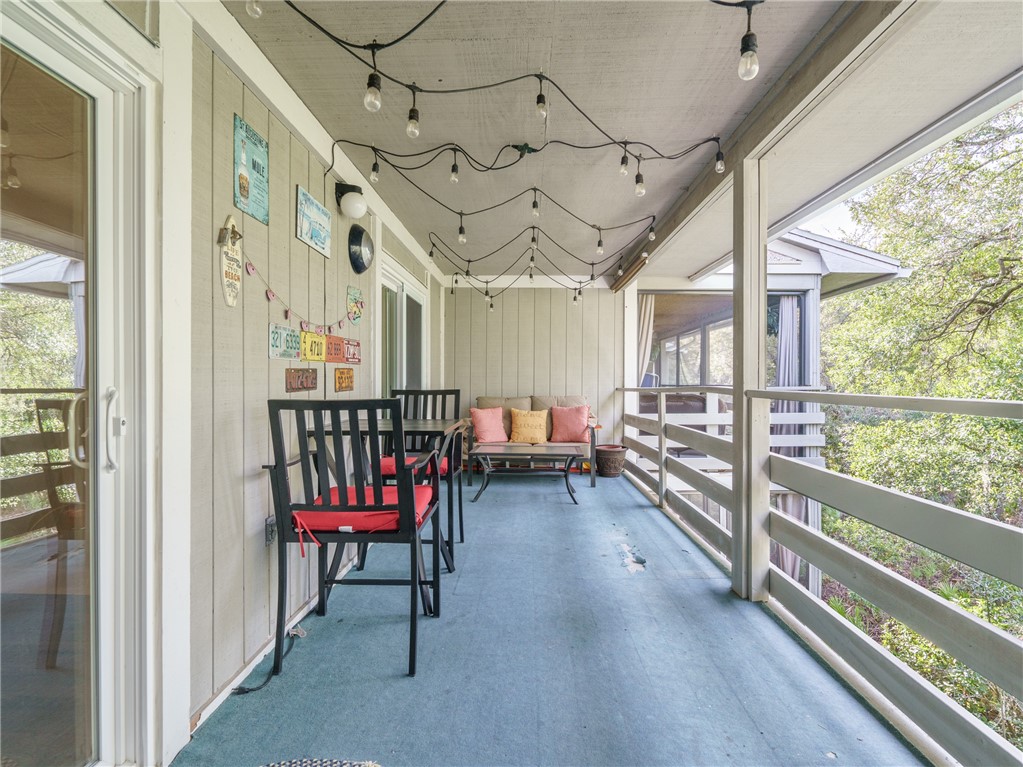 2328 Sadler Road, Unit 1E Fernandina Beach, FL 32034 - Photo 17 of 31 a view of a porch with furniture and a window