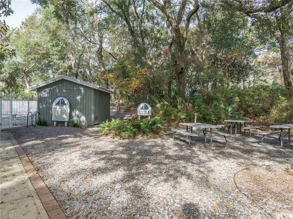2328 Sadler Road, Unit 1E Fernandina Beach, FL 32034 - Photo 19 of 31 a view of a outdoor space with a patio and backyard