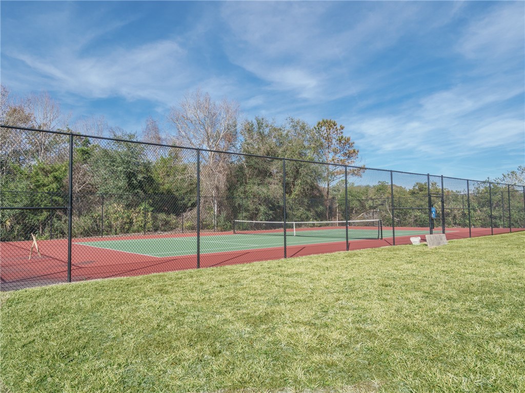 2328 Sadler Road, Unit 1E Fernandina Beach, FL 32034 - Photo 25 of 31 a view of a backyard with swimming pool