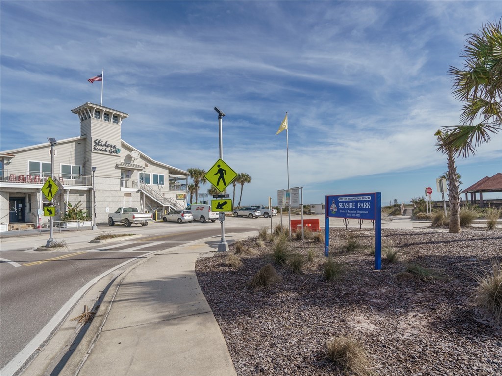2328 Sadler Road, Unit 1E Fernandina Beach, FL 32034 - Photo 30 of 31 a view of a park with swings and slides