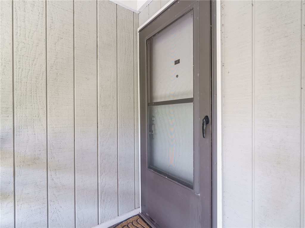 2328 Sadler Road, Unit 1E Fernandina Beach, FL 32034 - Photo 3 of 31 a view of a bathroom from a hallway