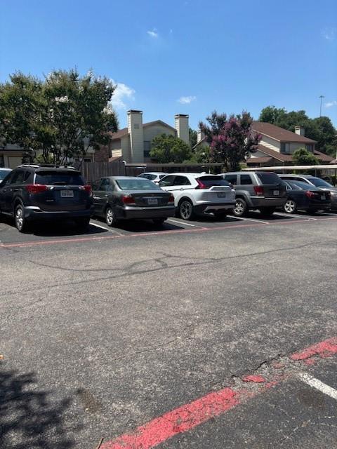 11311 Audelia Road, Unit 208 Dallas, TX 75243 - Photo 10 of 11 View of uncovered parking lot