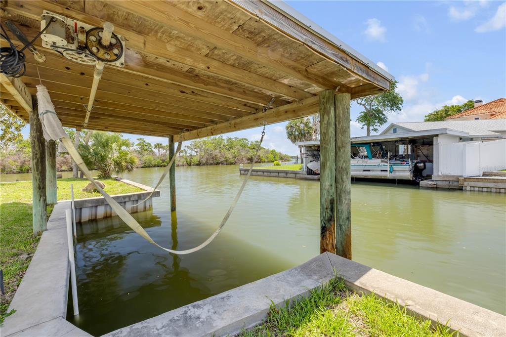 192 Azalea Road Edgewater, FL 32141 - Photo 63 of 94 a view of a swimming pool with a patio