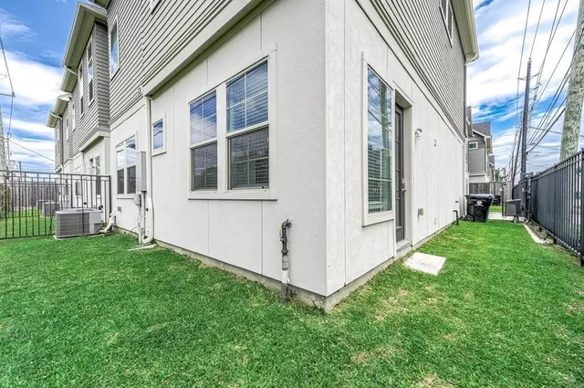 a view of a back yard of the house