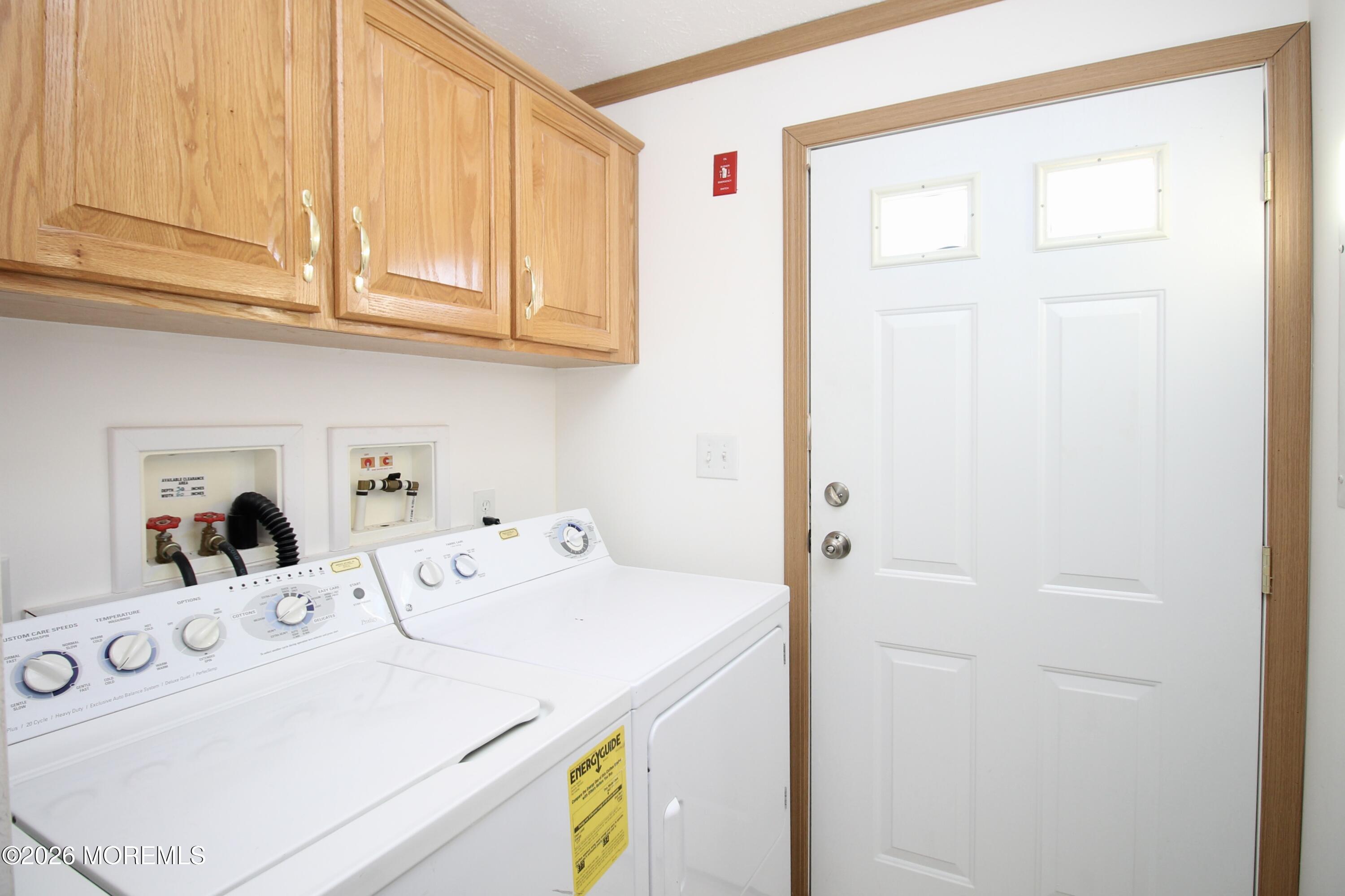 75 Robin Place Freehold, NJ 07728 - Photo 24 of 36 a utility room with dryer and washer