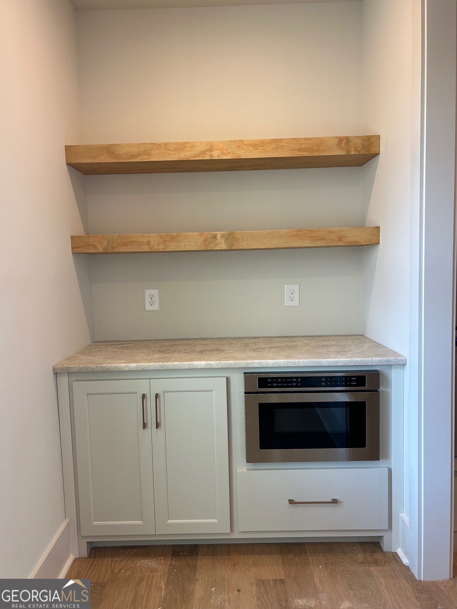 158 Snug Harbor Place Newnan, GA 30263 - Photo 13 of 94 a close view of a stove top oven sitting inside of a kitchen