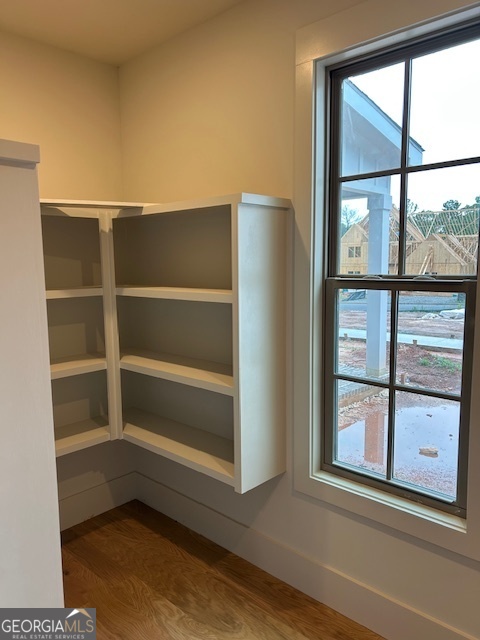 158 Snug Harbor Place Newnan, GA 30263 - Photo 14 of 94 a view of a room with rack on the wall and a window