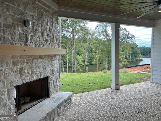 158 Snug Harbor Place Newnan, GA 30263 - Photo 27 of 94 a backyard of a house with a garden and outdoor seating