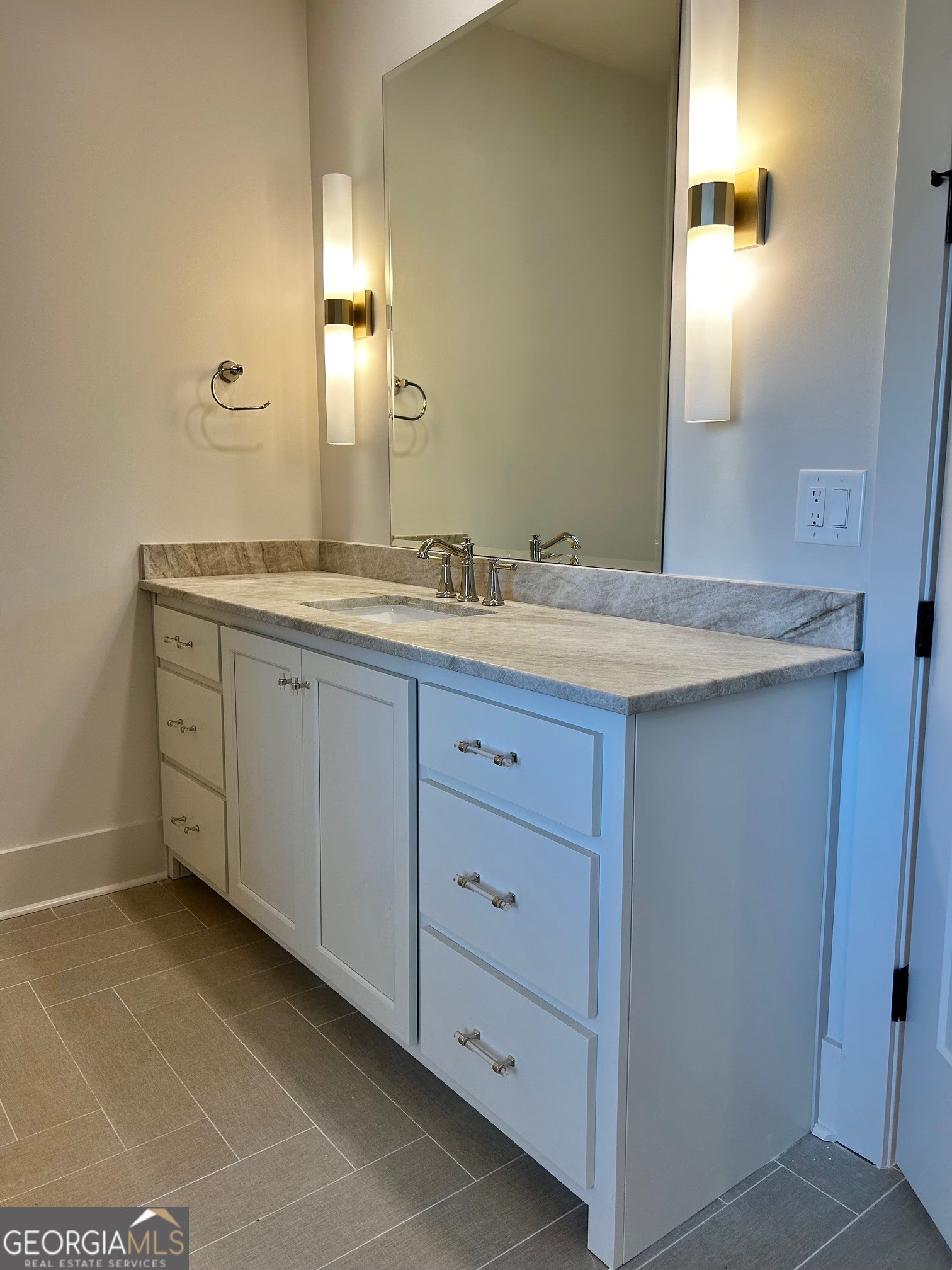 158 Snug Harbor Place Newnan, GA 30263 - Photo 44 of 94 a bathroom with a granite countertop sink and a mirror