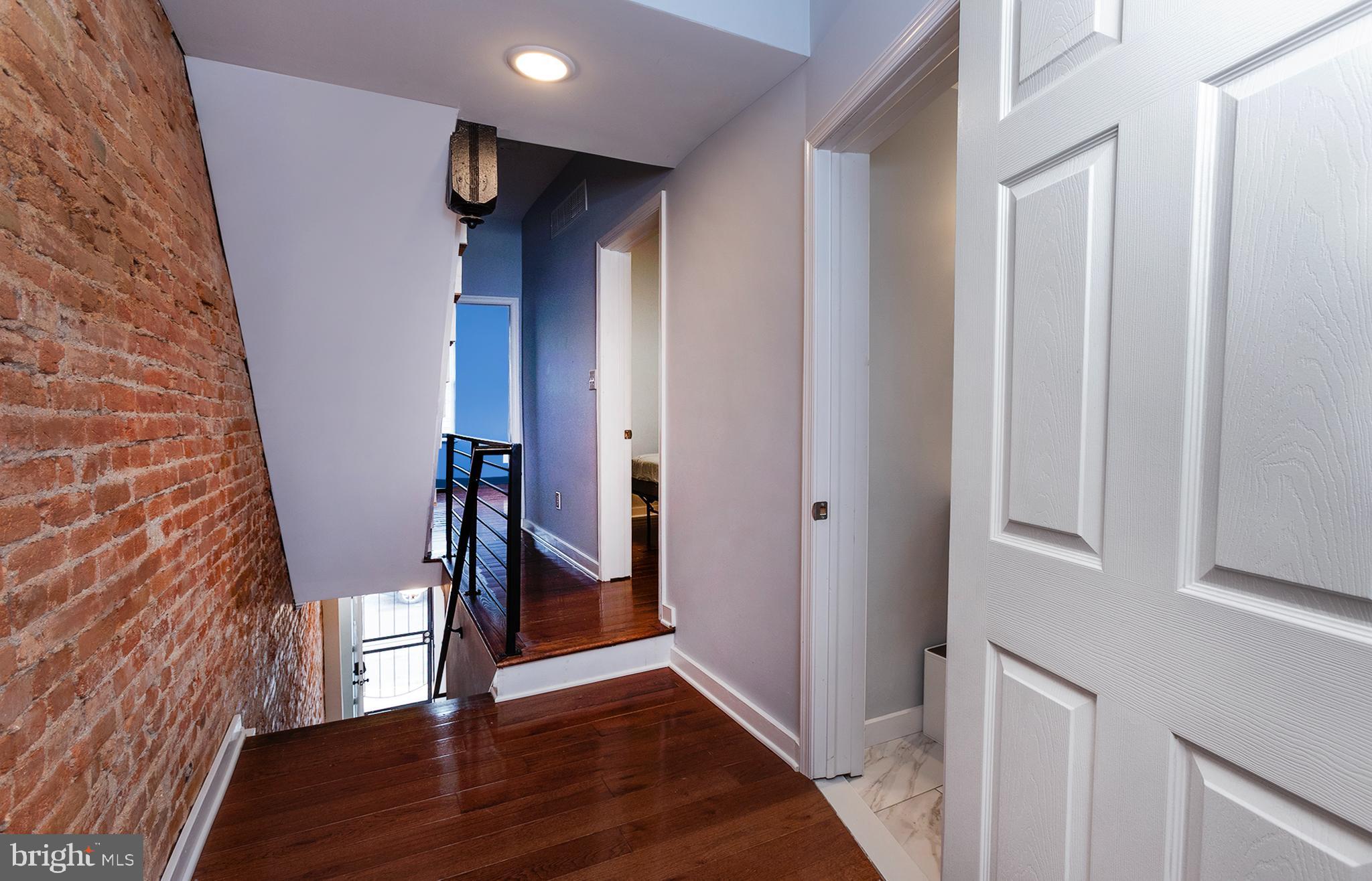 1750 North 25th Street Philadelphia, PA 19121 - Photo 13 of 37 a view of entryway with wooden floor