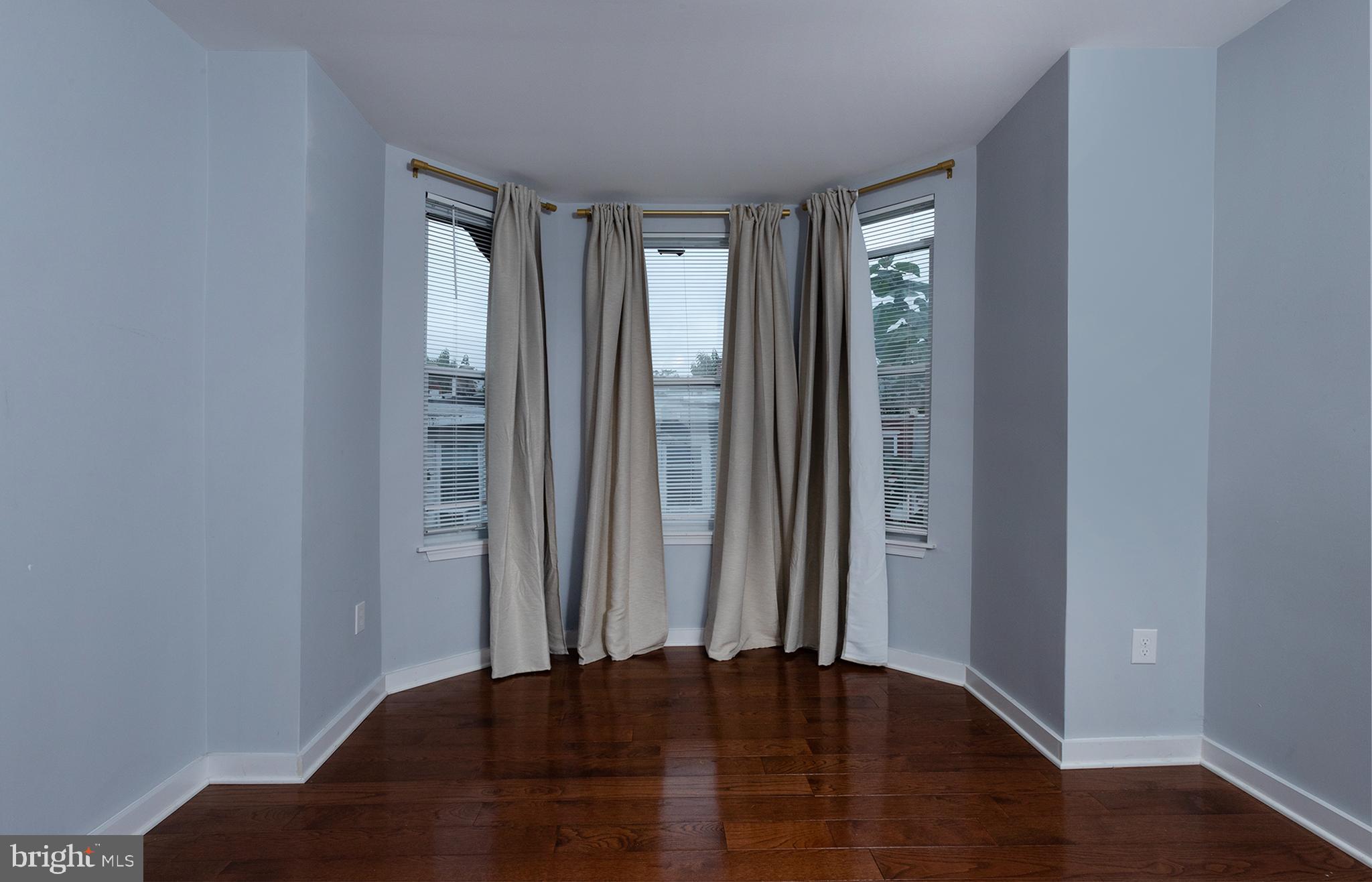 1750 North 25th Street Philadelphia, PA 19121 - Photo 21 of 37 a view of an empty room with wooden floor