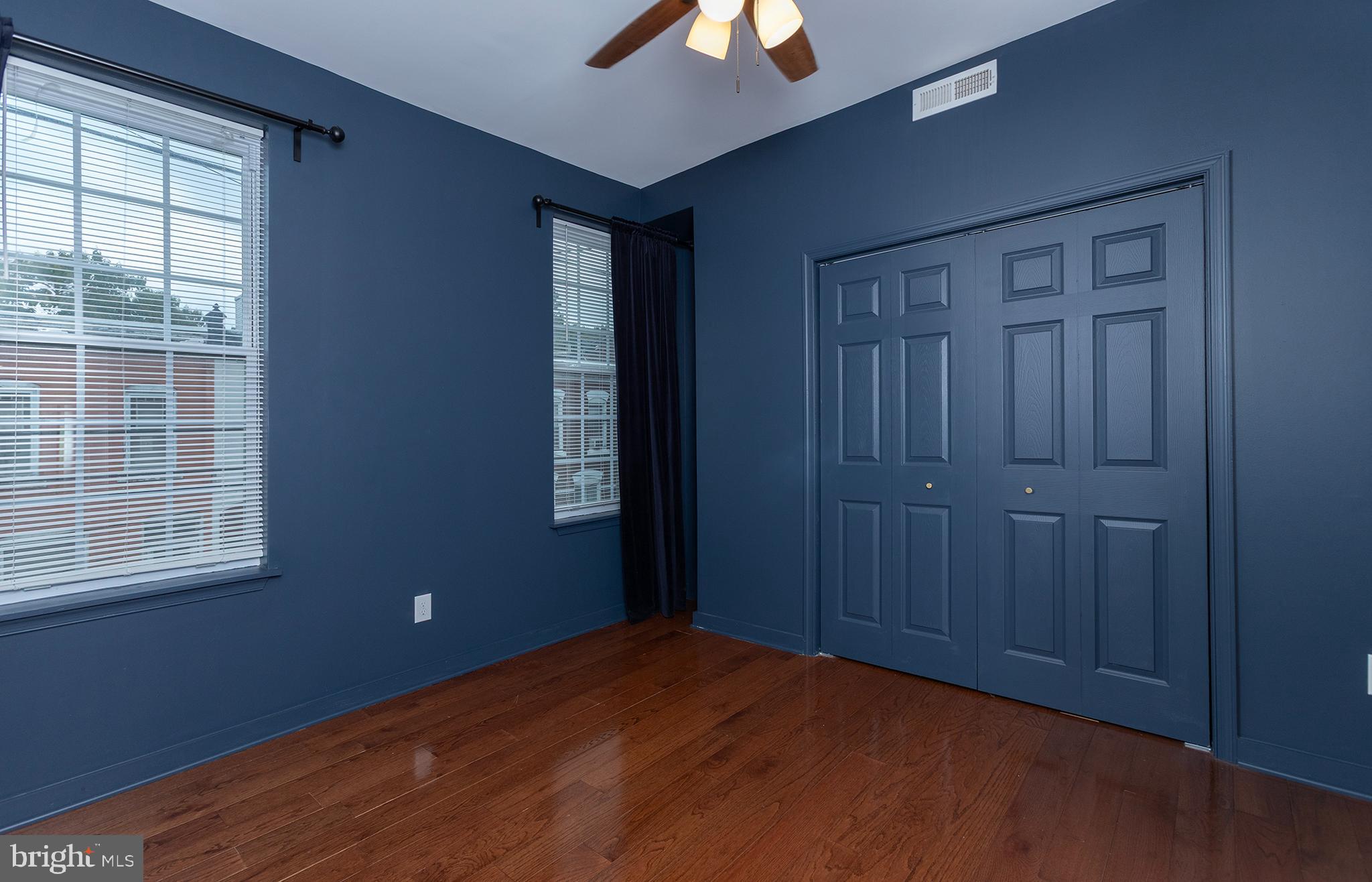 1750 North 25th Street Philadelphia, PA 19121 - Photo 25 of 37 an empty room with windows and closet