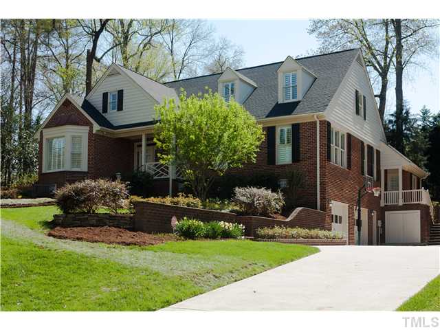 3928 Westchester Road Durham, NC 27707 - Photo 1 of 21 Spacious backyard with a level area for the kids to play. Mature trees in the rear create privacy on this .55 acre lot. Ample parking available for guests. All areas of yard suitable for activities.