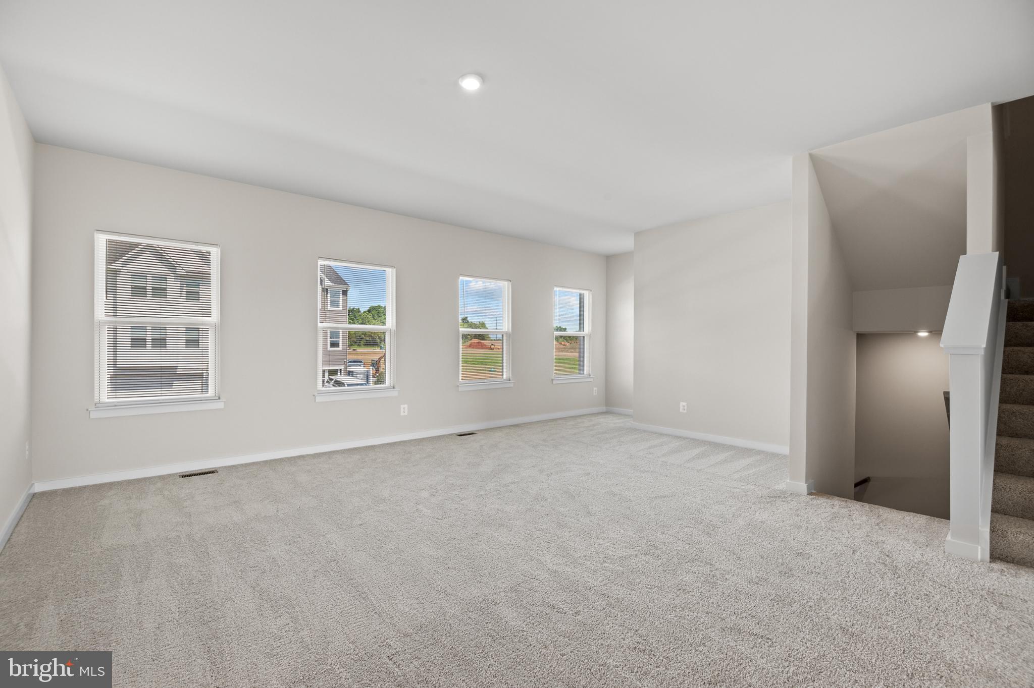 21 Lyriq Court Inwood, WV 25428 - Photo 15 of 40 an empty room with windows and closet