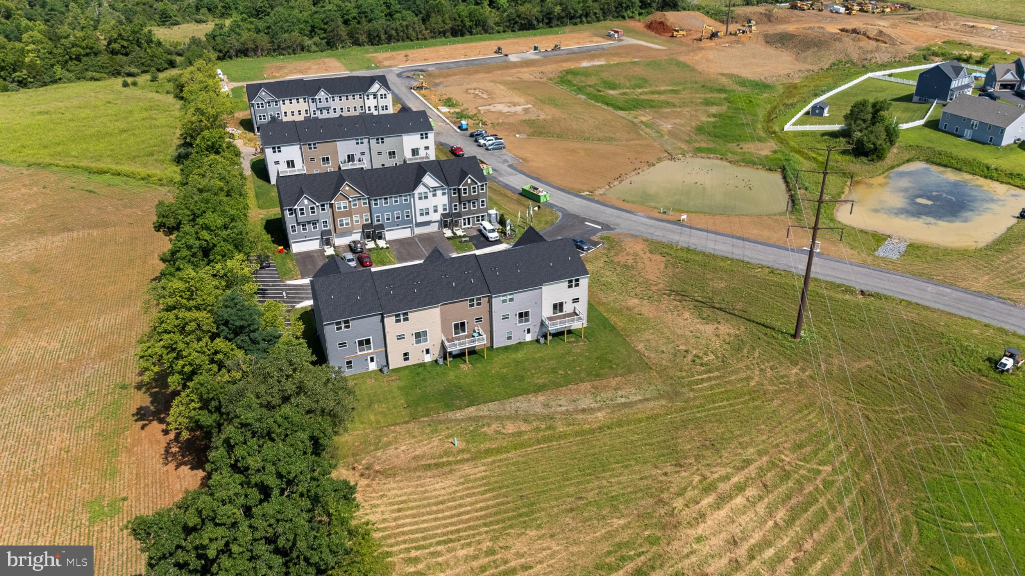 21 Lyriq Court Inwood, WV 25428 - Photo 3 of 40 a aerial view of a house with a swimming pool