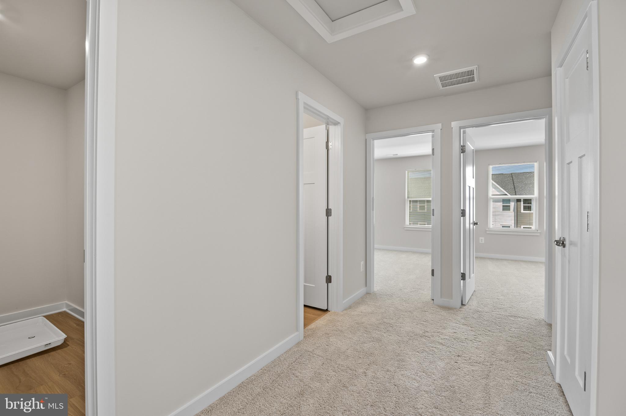 21 Lyriq Court Inwood, WV 25428 - Photo 39 of 40 a view of a hallway with toilet and bathroom