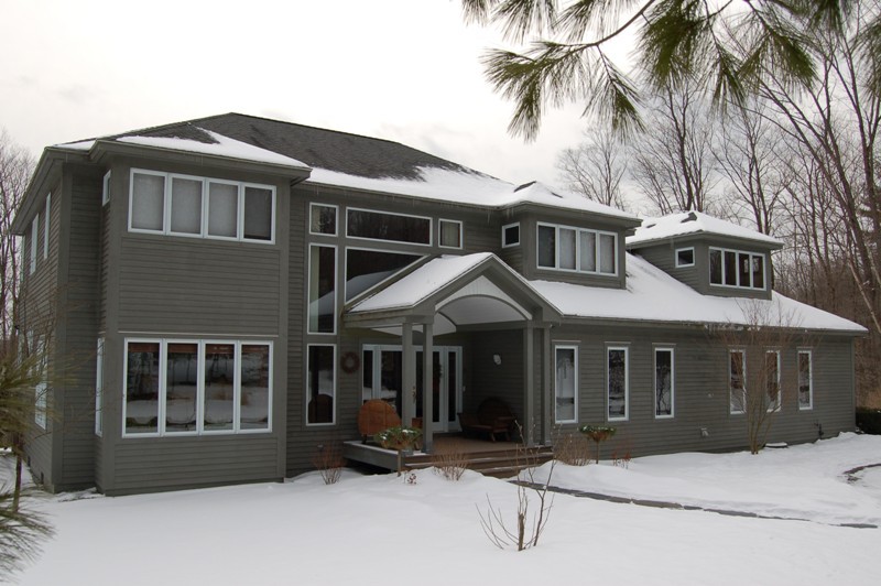 275 Hupi Road Monterey, MA 01245 - Photo 1 of 40 a front view of a house with a yard