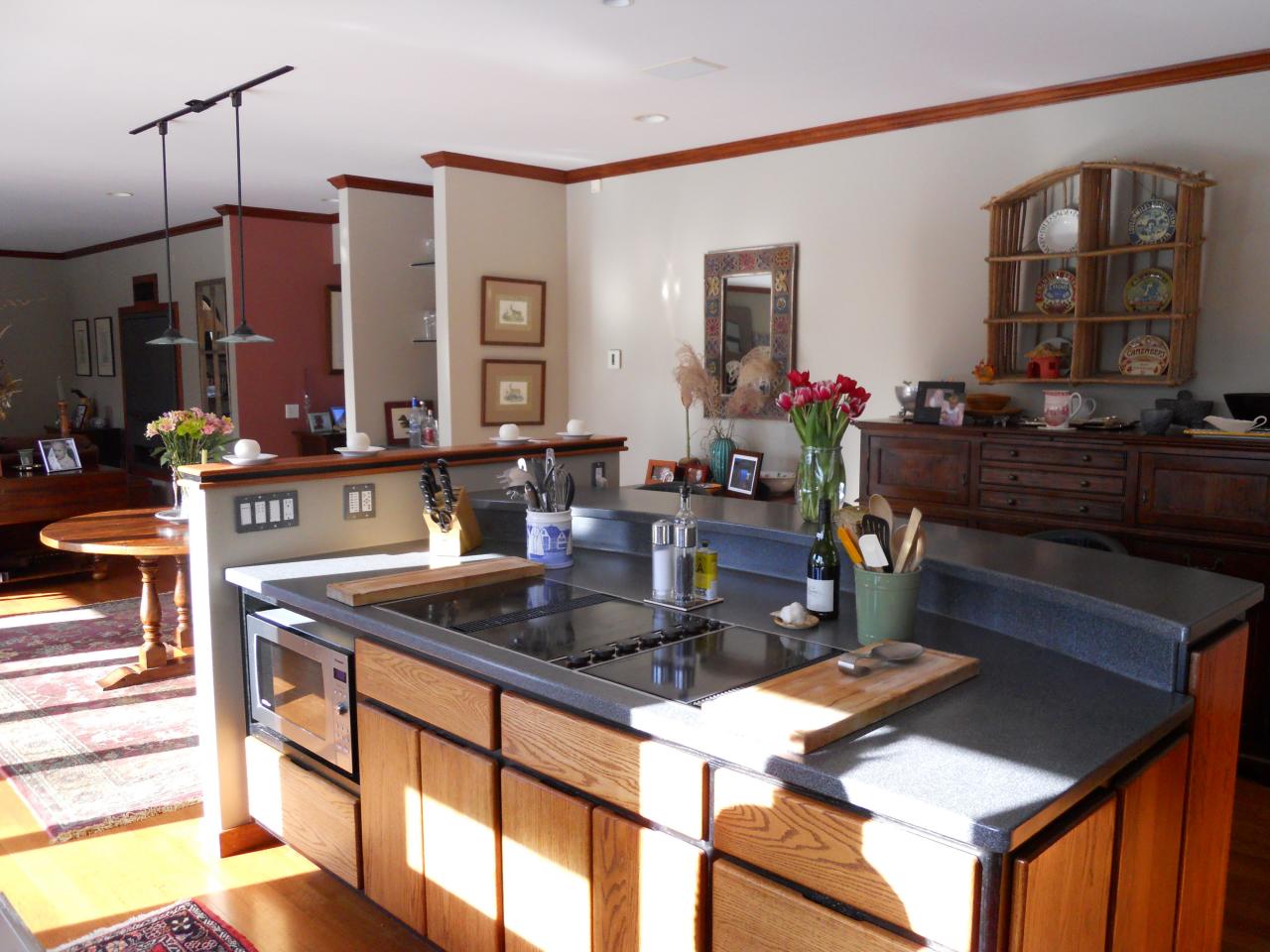 275 Hupi Road Monterey, MA 01245 - Photo 12 of 40 a kitchen with a stove a sink and a dining table