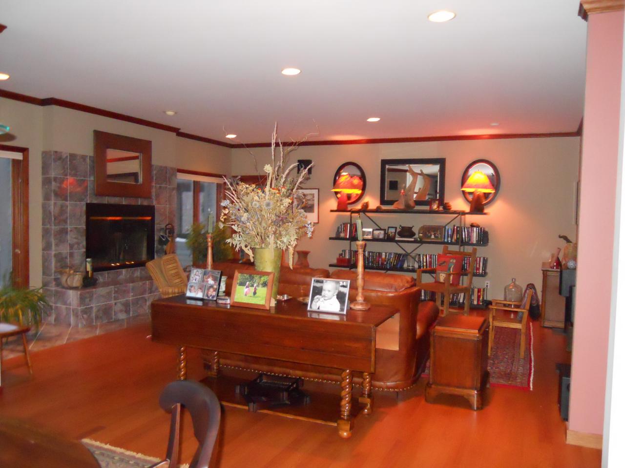 275 Hupi Road Monterey, MA 01245 - Photo 16 of 40 a living room with furniture and a clock