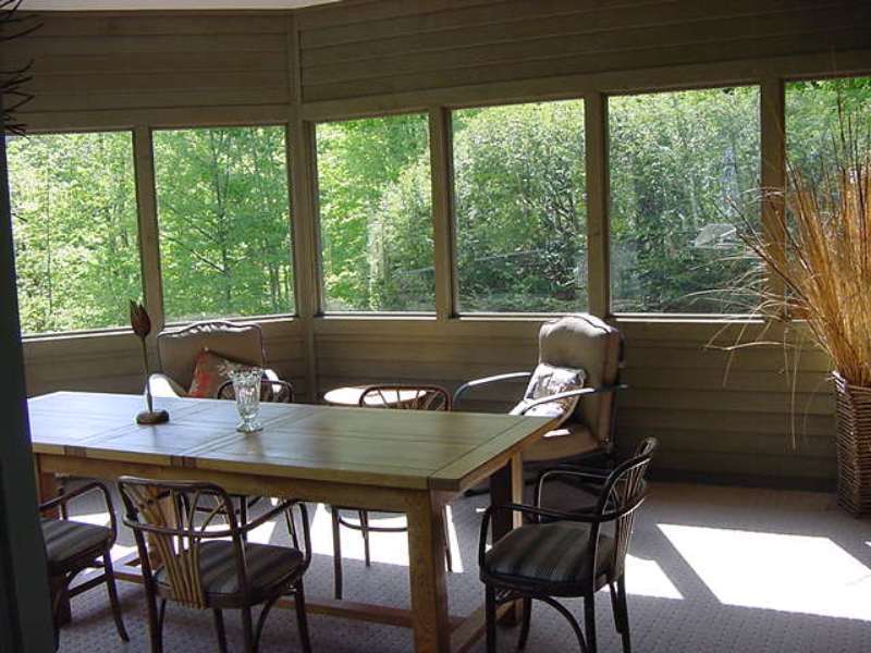 275 Hupi Road Monterey, MA 01245 - Photo 18 of 40 a view of a dining room with furniture and window