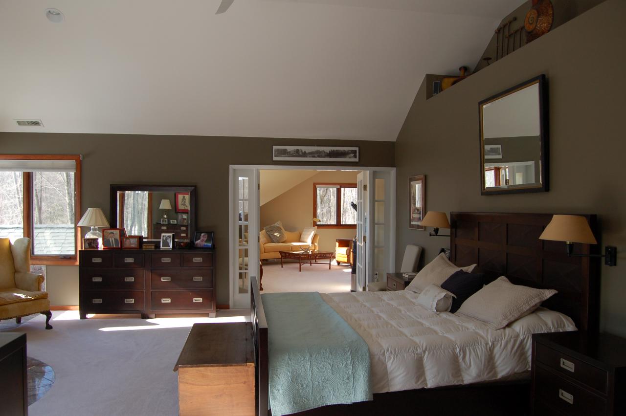 275 Hupi Road Monterey, MA 01245 - Photo 19 of 40 a bedroom with a bed window and couch