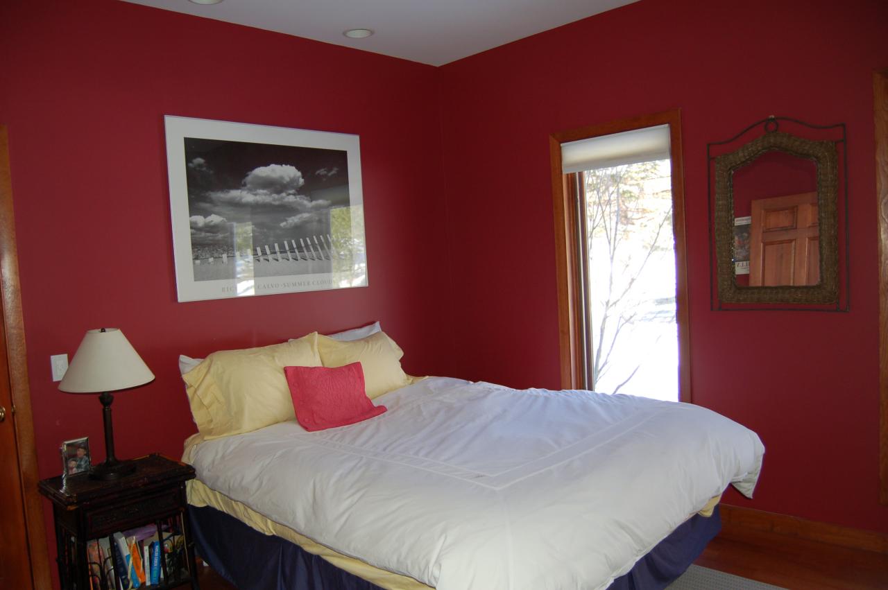 275 Hupi Road Monterey, MA 01245 - Photo 26 of 40 a bedroom with a bed and a lamp on dresser