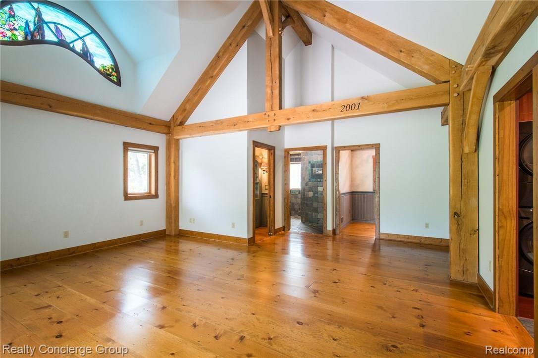 6022 Challis Road Brighton, MI 48116 - Photo 17 of 41 Enormous Master with Custom Stained Glass