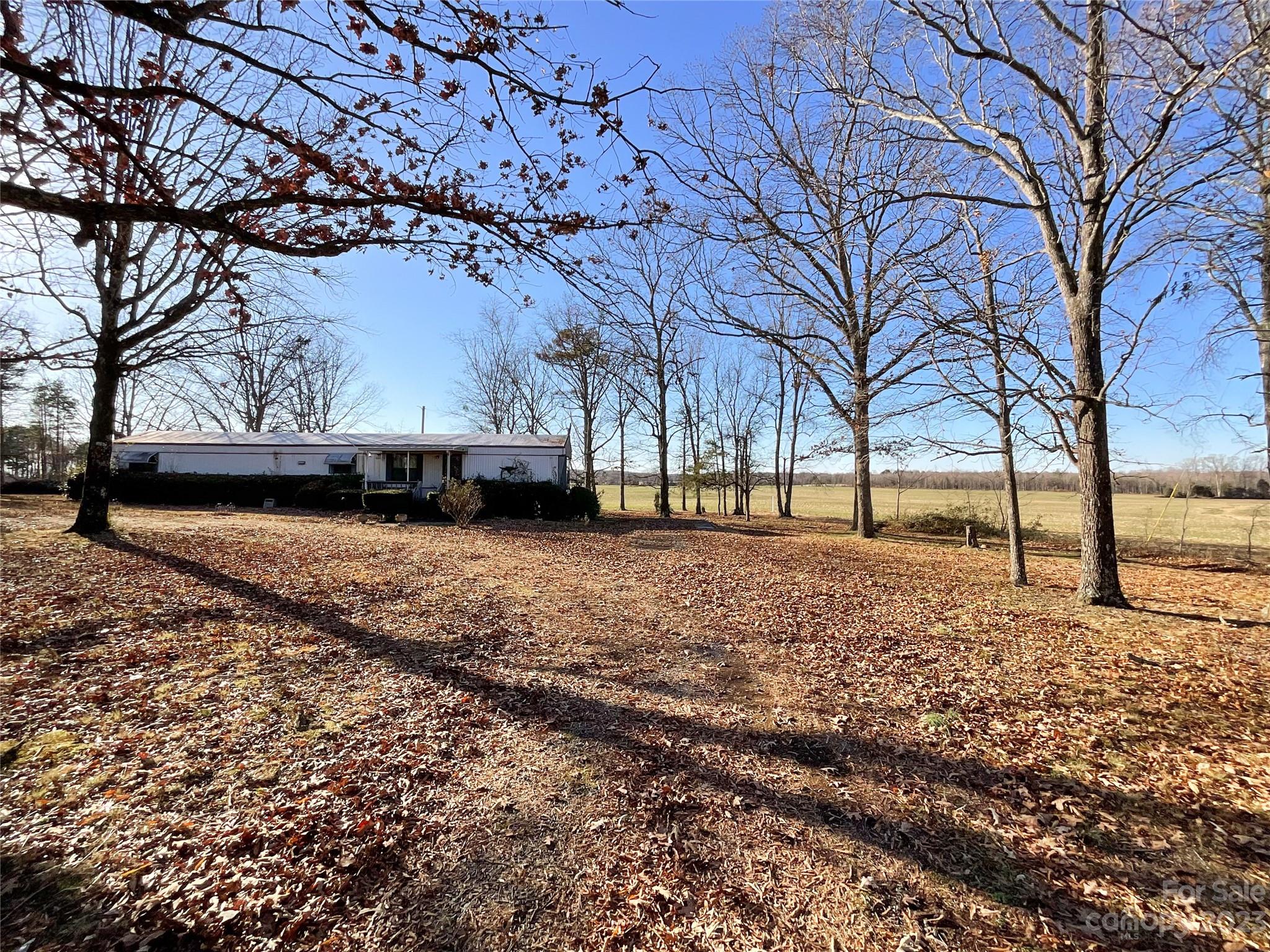 2508 Stack Road Monroe, NC 28112 - Photo 23 of 36 a view of yard with trees in the background