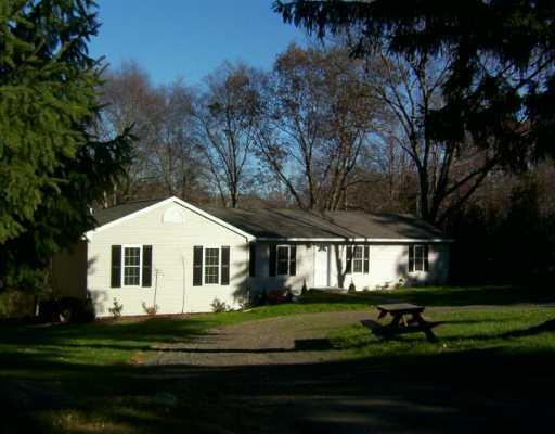 88 B Ironworks Road Clinton, CT 06413 - Photo 1 of 1 a front view of a house with a garden