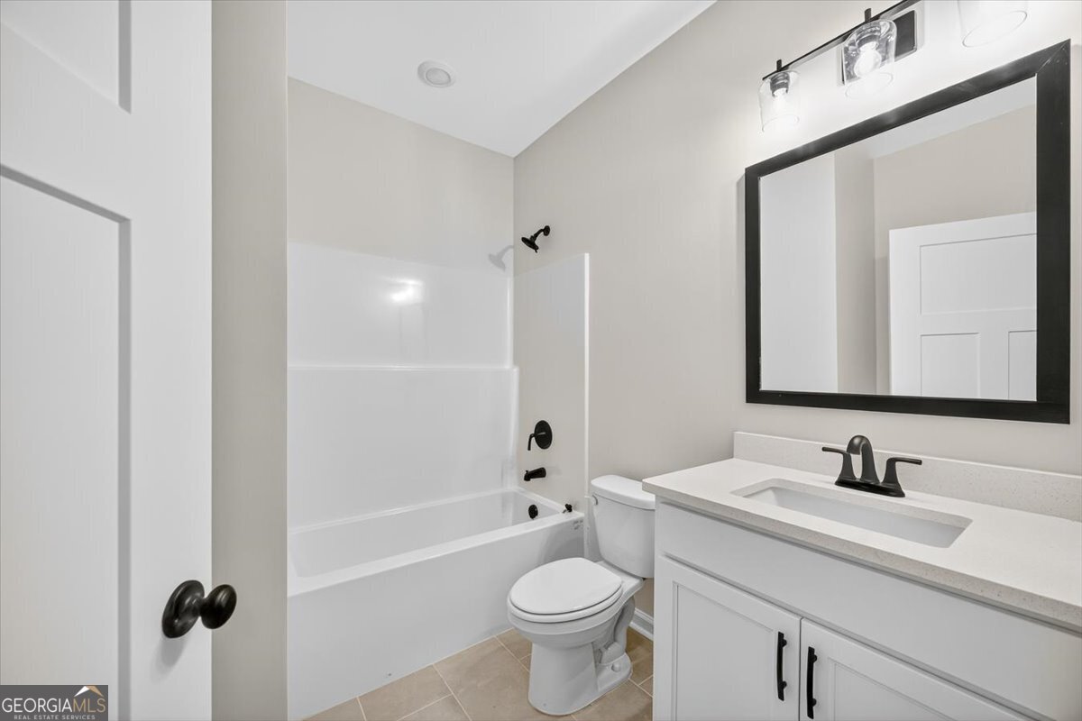 1570 The Rock Road Thomaston, GA 30286 - Photo 35 of 53 a bathroom with a sink toilet and shower