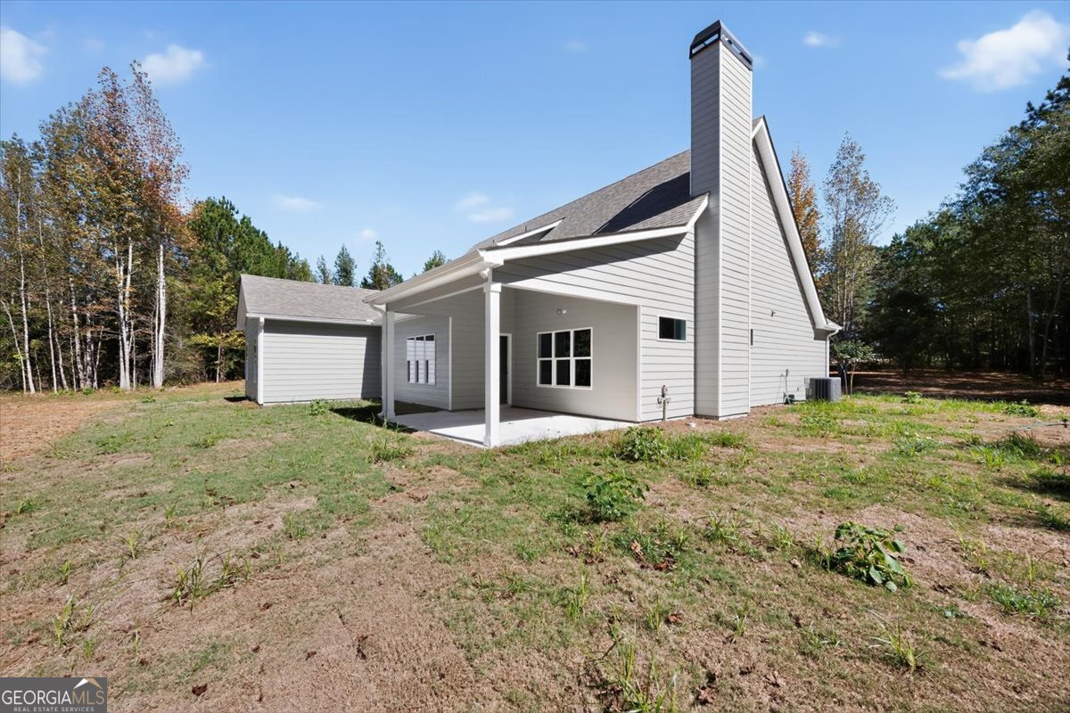 1570 The Rock Road Thomaston, GA 30286 - Photo 40 of 53 a view of a house with backyard and garden