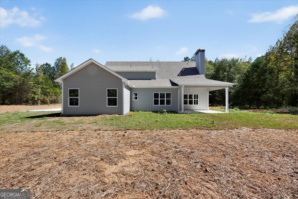 1570 The Rock Road Thomaston, GA 30286 - Photo 42 of 53 a view of house with a yard