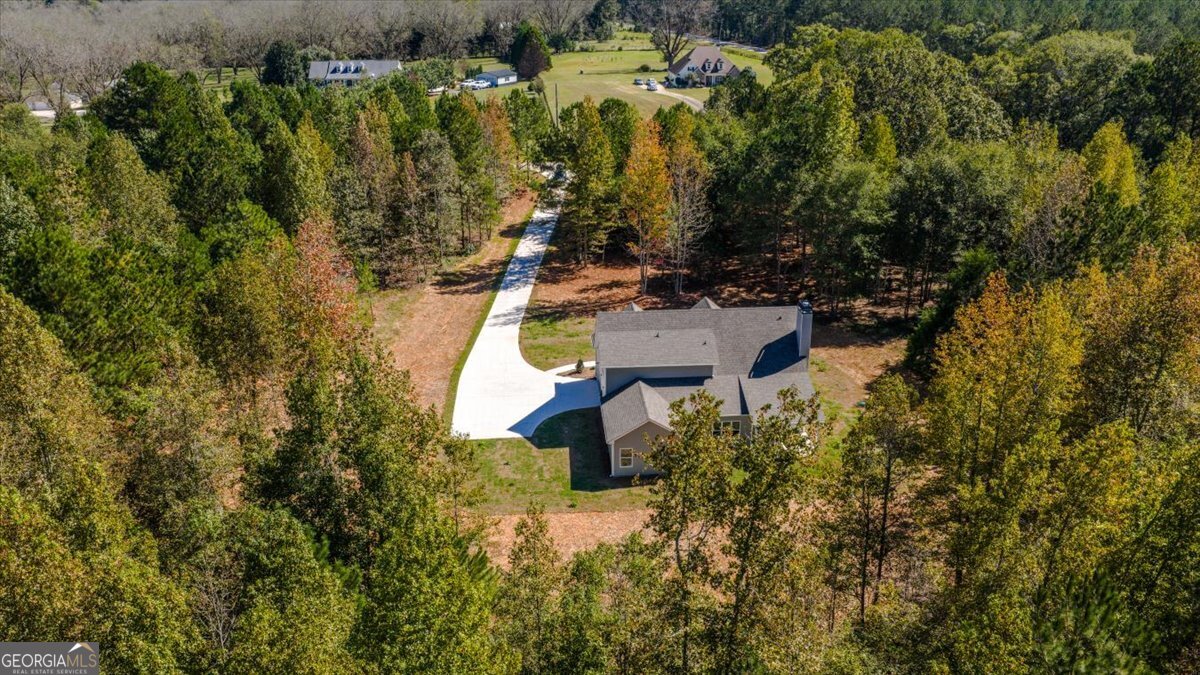 1570 The Rock Road Thomaston, GA 30286 - Photo 50 of 53 an aerial view of residential house with outdoor space and trees all around