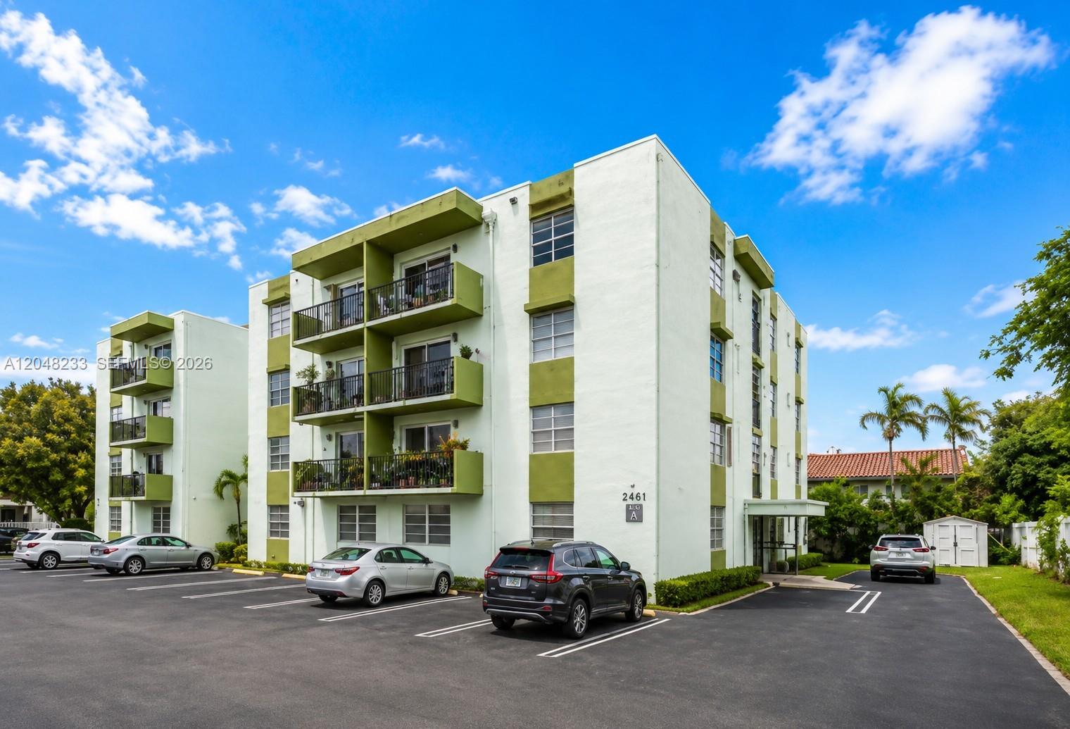 1530 Southwest 2nd Street, Unit 307 Miami, FL 33135 - Photo 1 of 7 a car parked in front of a building
