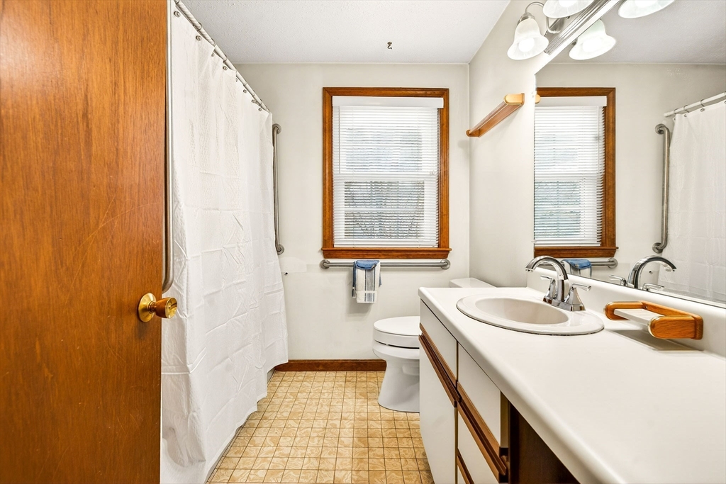 61 Fox Meadow Road, Unit A Leominster, MA 01453 - Photo 15 of 38 a bathroom with a sink and a bathtub