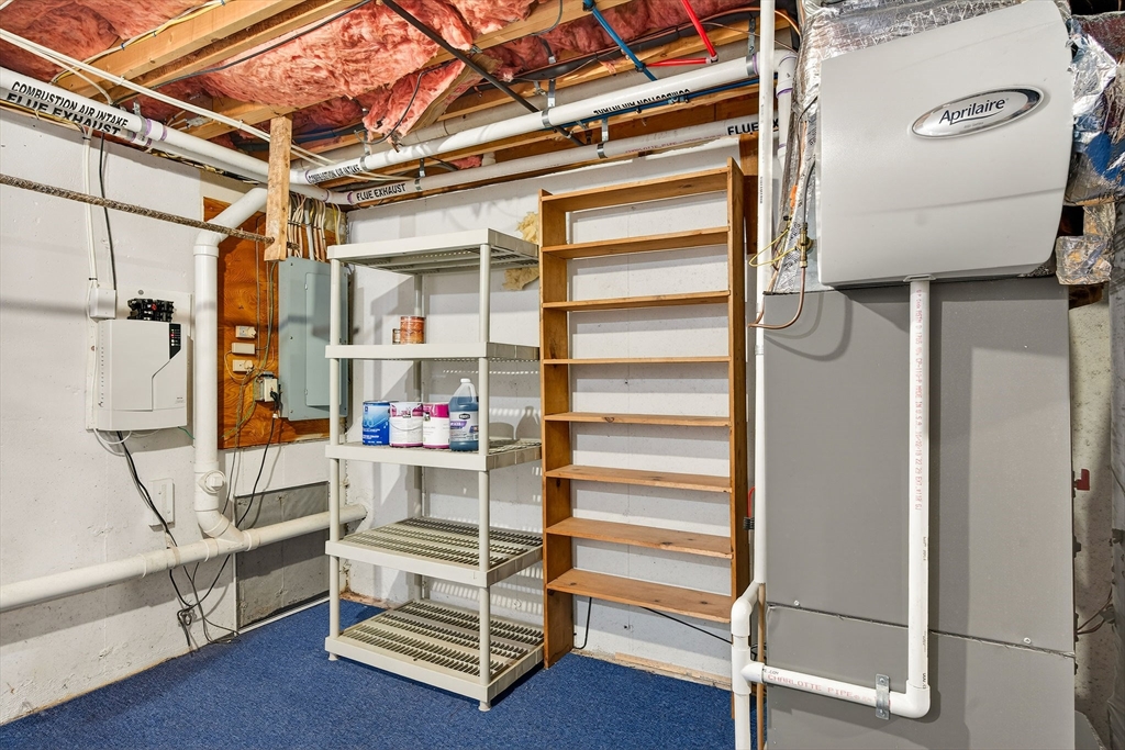 61 Fox Meadow Road, Unit A Leominster, MA 01453 - Photo 27 of 38 a view of walk in closet with empty racks