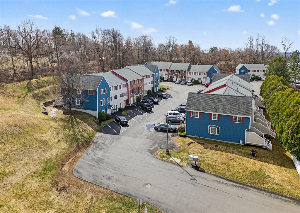 61 Fox Meadow Road, Unit A Leominster, MA 01453 - Photo 34 of 38 a view of a house with a yard
