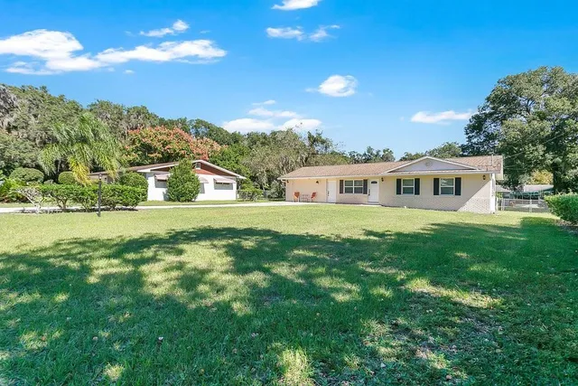 a house view with a garden space