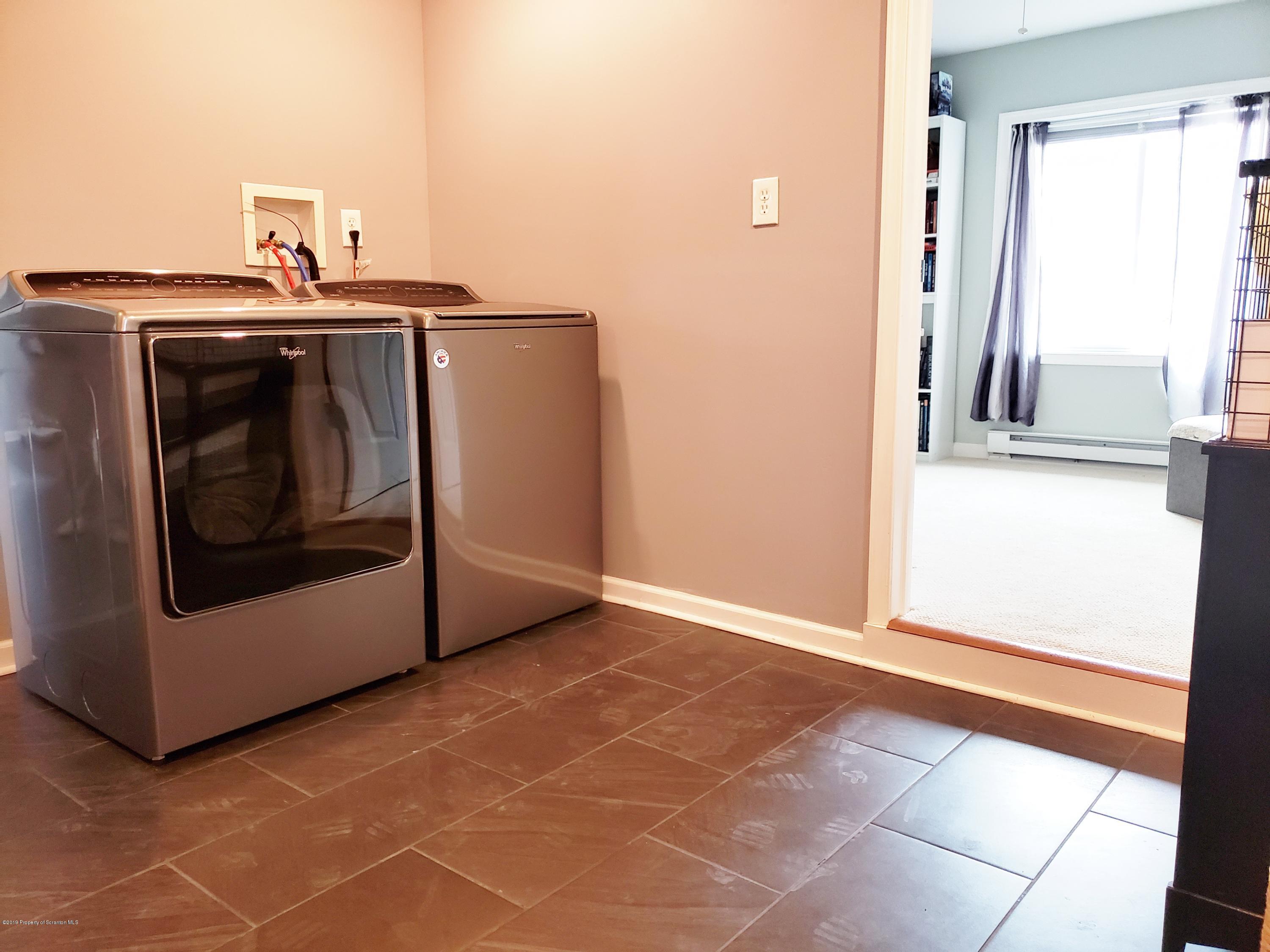 1816 Green Ridge Street Dunmore, PA 18509 - Photo 17 of 30 a view of a utility room with washer and dryer