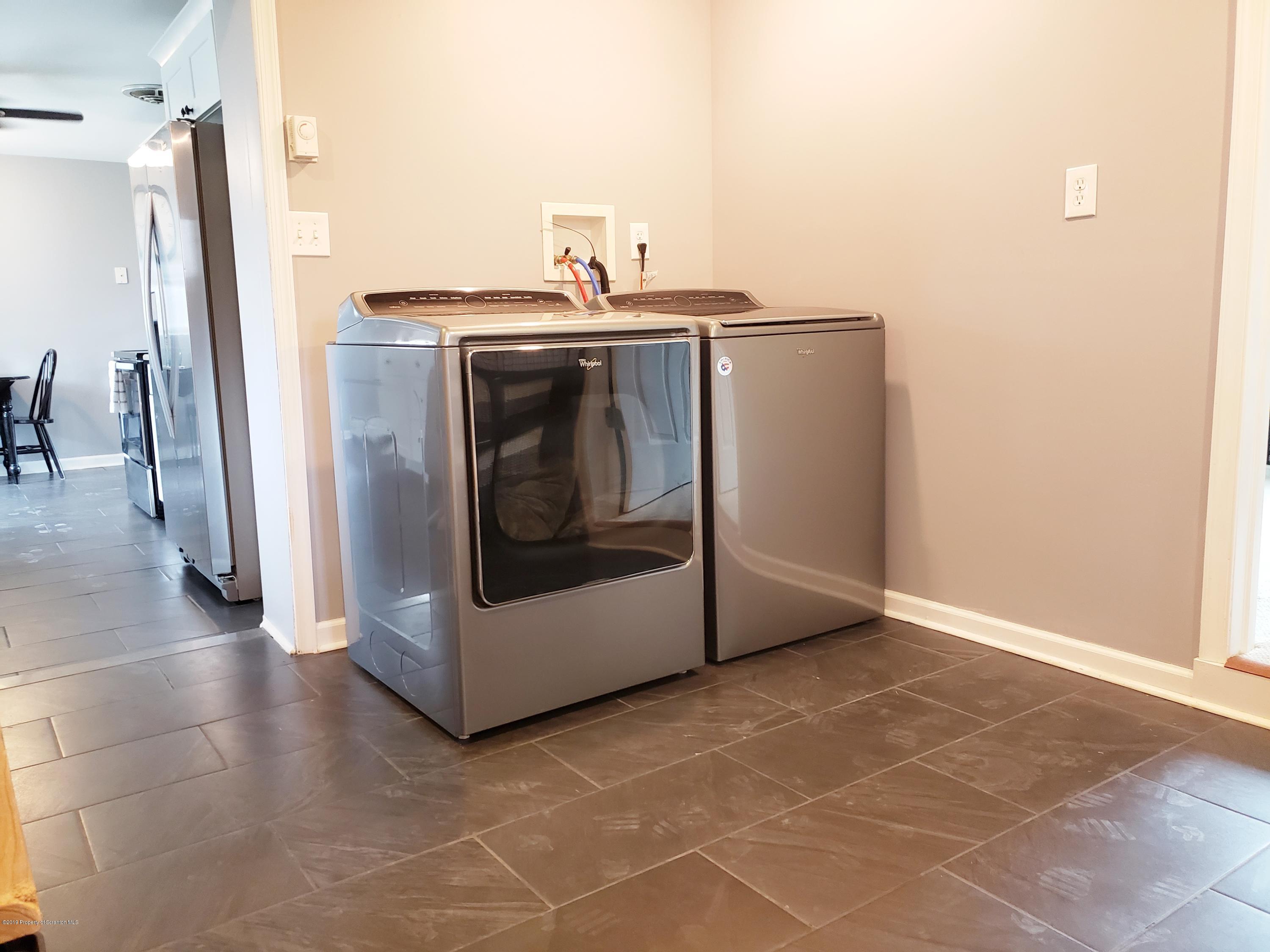 1816 Green Ridge Street Dunmore, PA 18509 - Photo 18 of 30 a utility room with washer and dryer