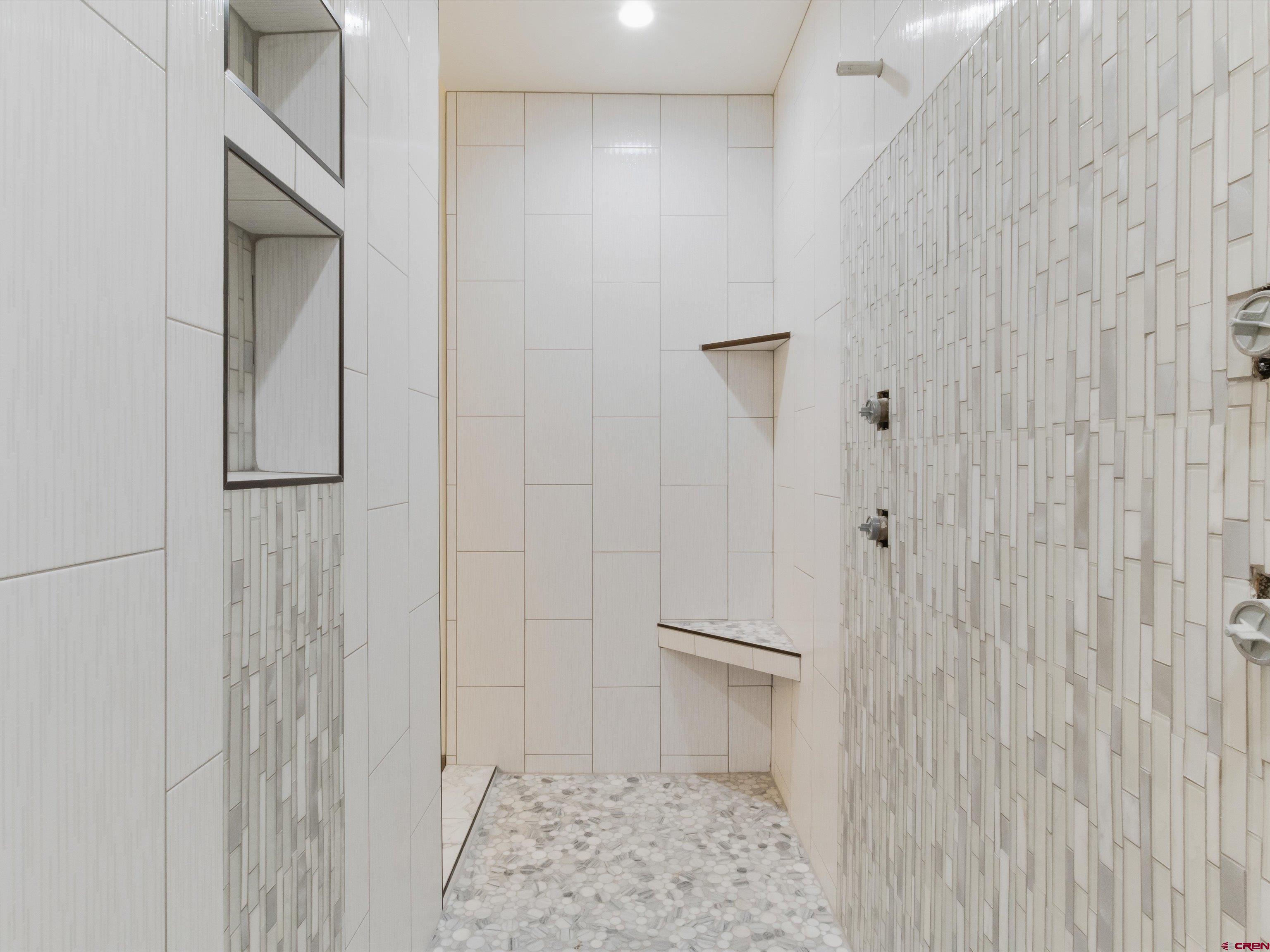 1900 Snaffle Bit Road Delta, CO 81416 - Photo 17 of 33 a bathroom with a shower