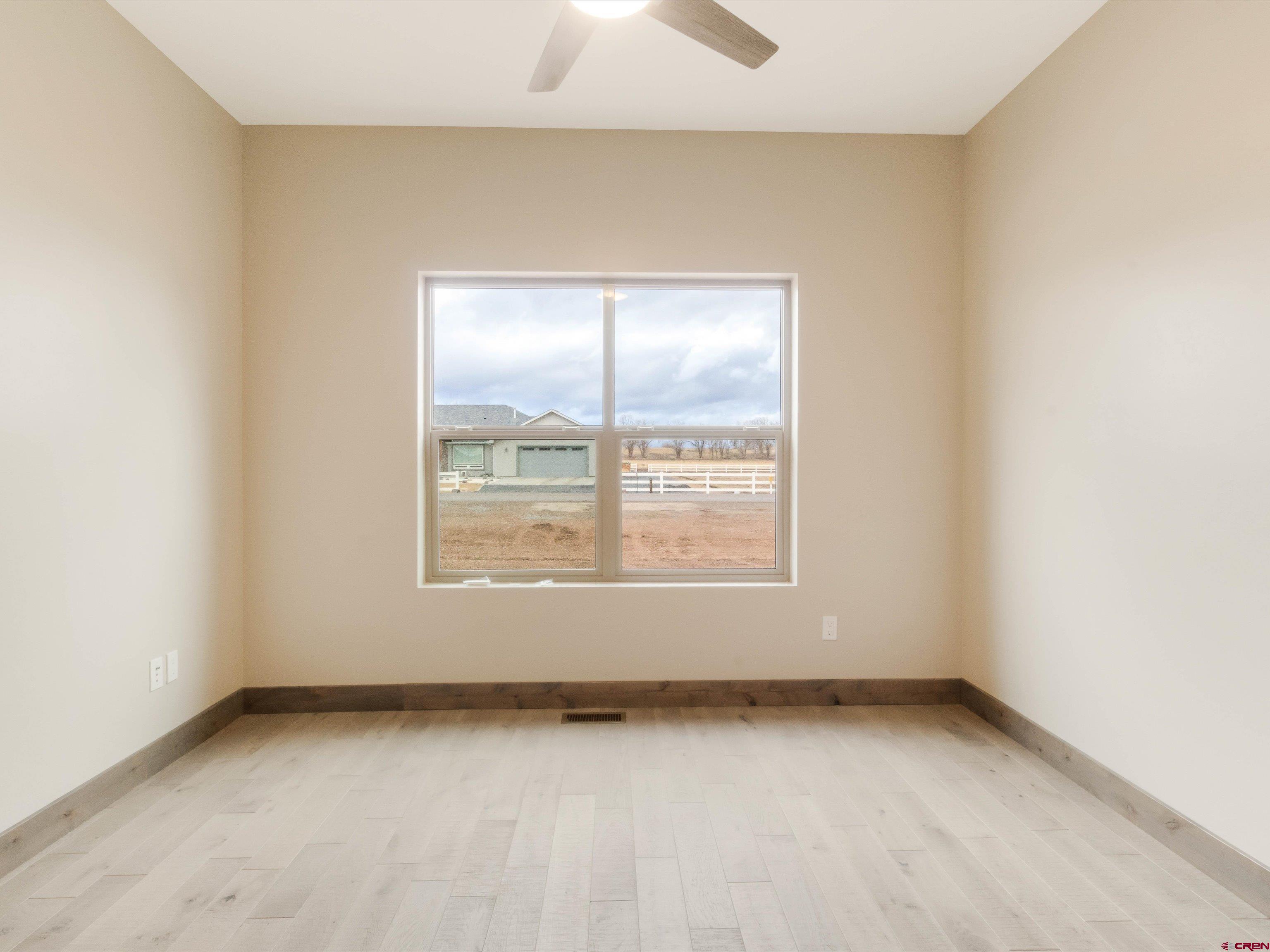 1900 Snaffle Bit Road Delta, CO 81416 - Photo 22 of 33 an empty room with a window