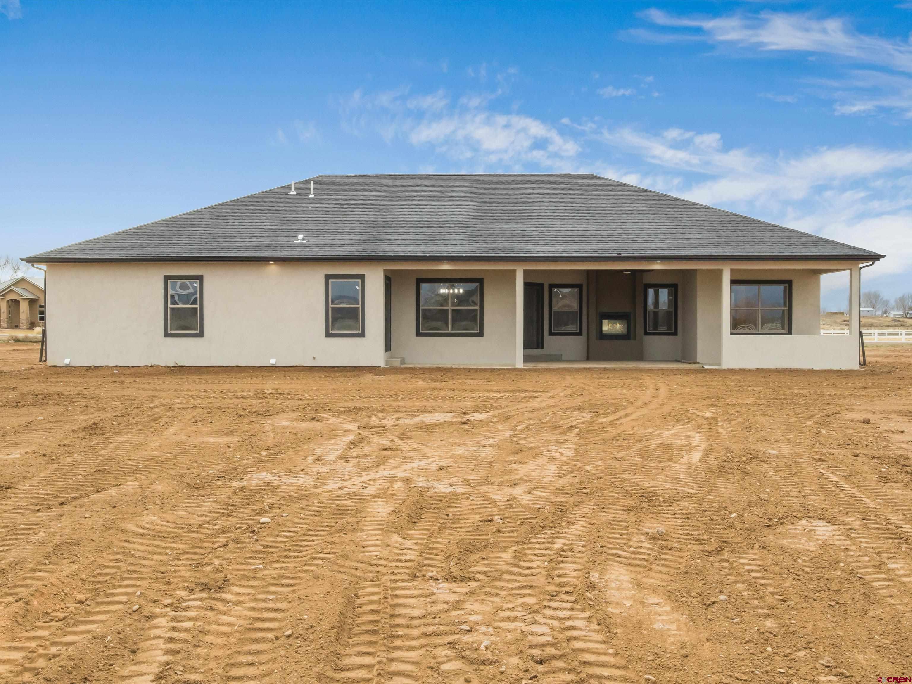 1900 Snaffle Bit Road Delta, CO 81416 - Photo 32 of 33 a front view of house with yard