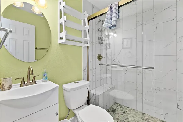 a view of a balcony with furniture