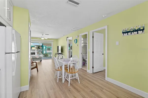 a kitchen with stainless steel appliances granite countertop a sink a stove and a granite counter tops