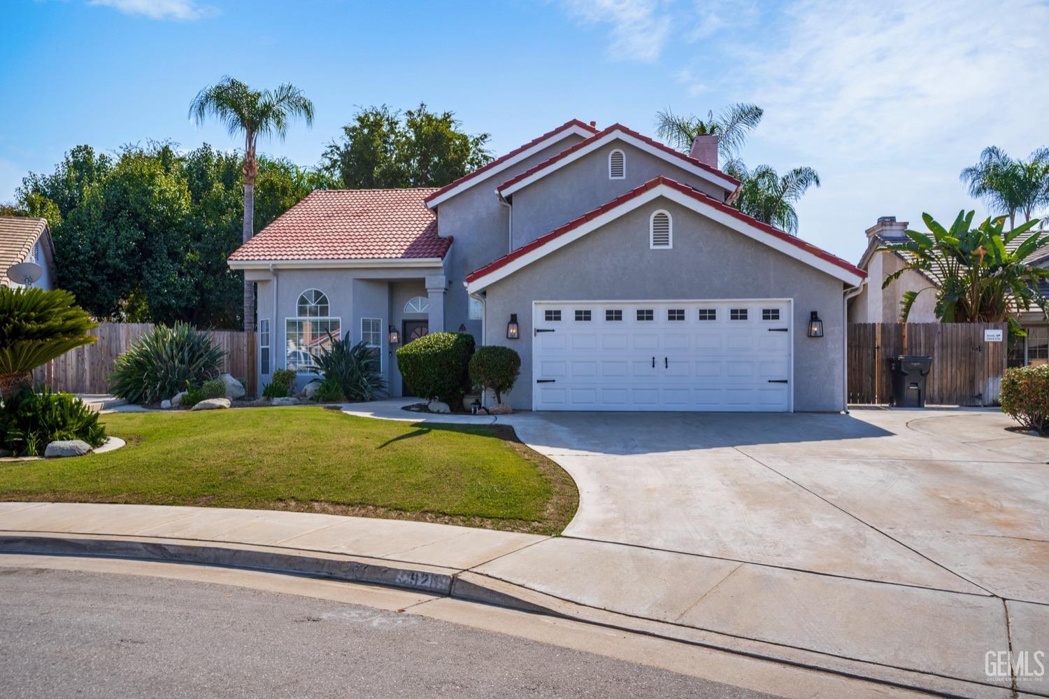 Undisclosed Address Bakersfield, CA 93312 - Photo 1 of 29 a house view with a garden space