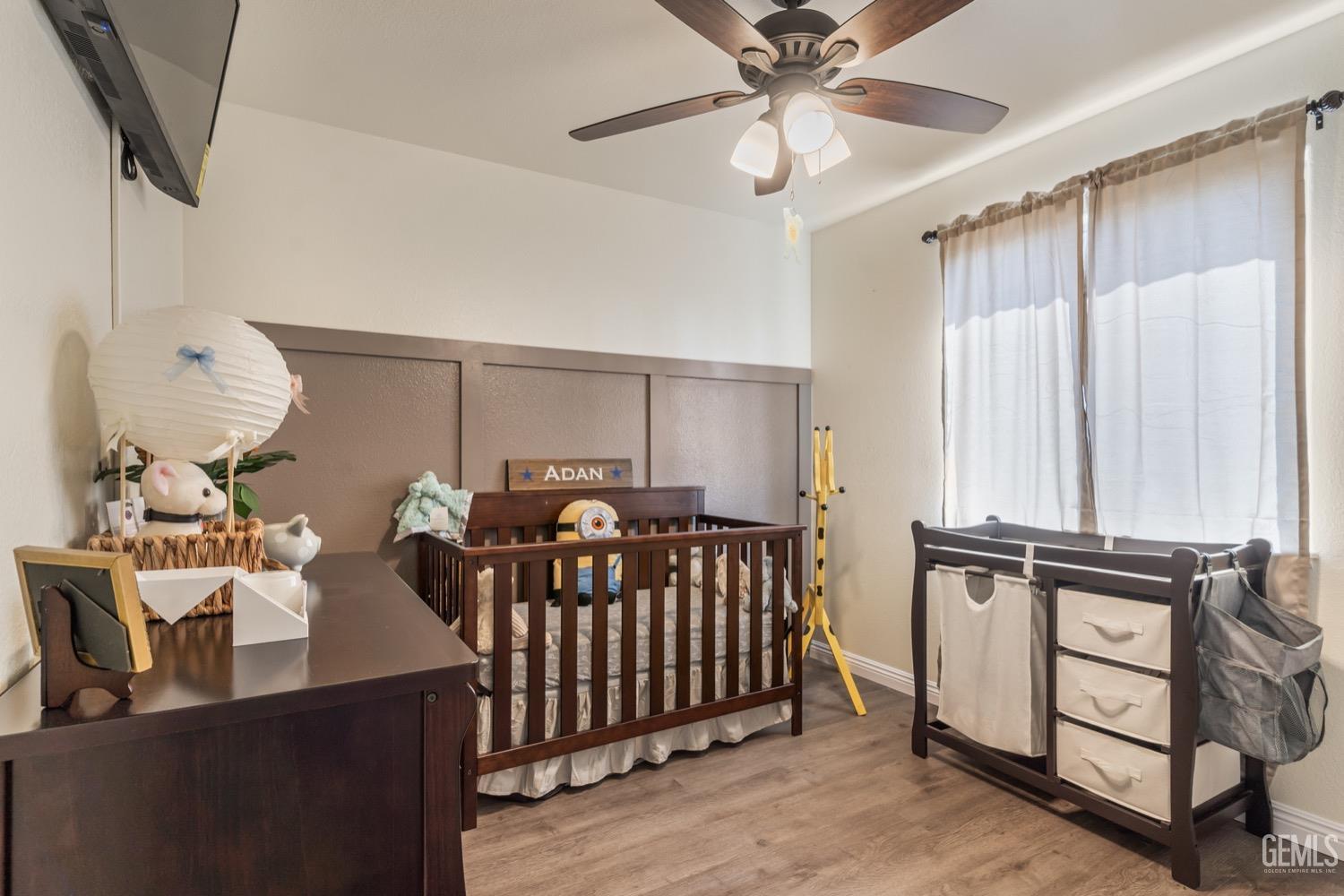 Undisclosed Address Bakersfield, CA 93312 - Photo 13 of 29 a bedroom with furniture and a window