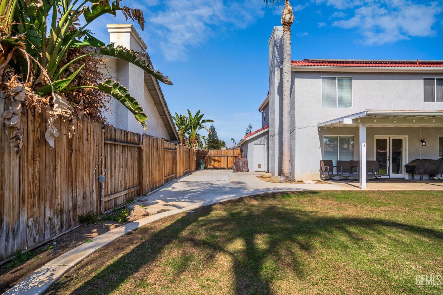 Undisclosed Address Bakersfield, CA 93312 - Photo 22 of 29 a view of a house with a swimming pool